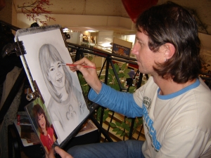 Artistul Lucian Mantoc face portrete si picteaza martisoare pe sticla