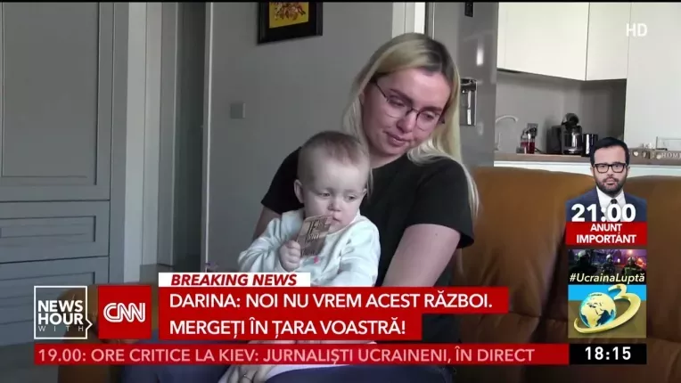 Povestea unei mame care a trecut cu bebelusul in brate pe sub ploaia de bombe si prin bataia gloante